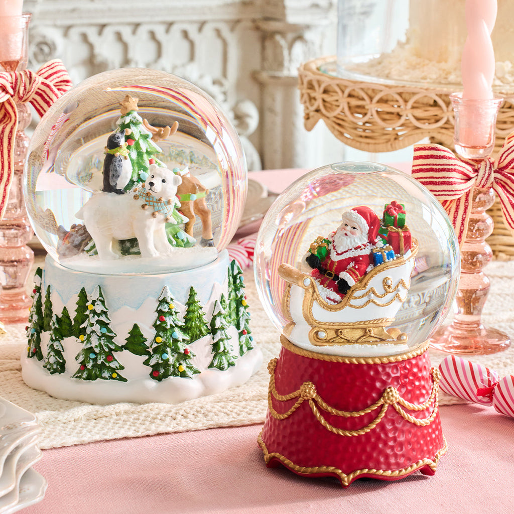 North Pole Santa in Sleigh Snow Globe
